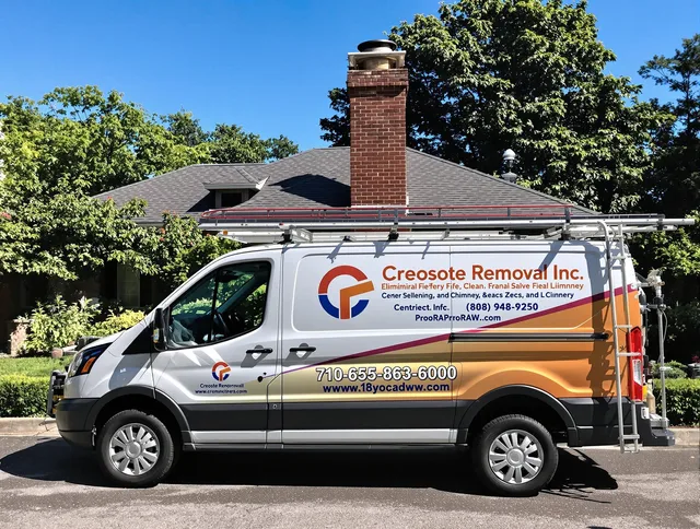 Twinsburg Chimney Sweep technician removing creosote safely in Twinsburg, OH